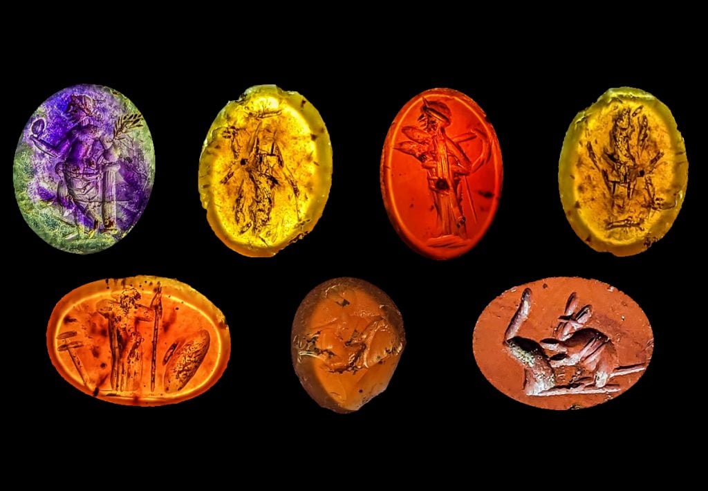 Carved gemstones from the third century discovered at the site of an ancient Roman bathhouse in Carslile, U.K. Photo by Anna Giecco.