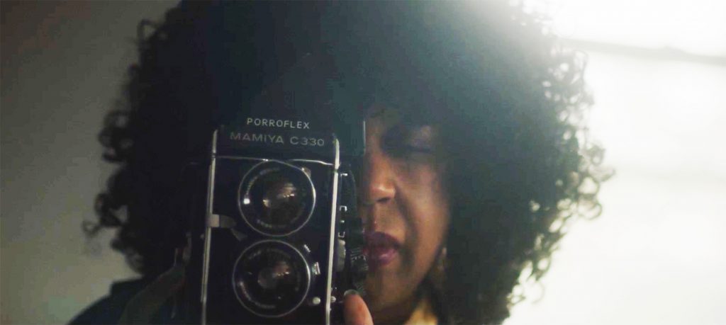 Screenshot from the trailer for The Sound She Saw, featuring Lauri Lyons.