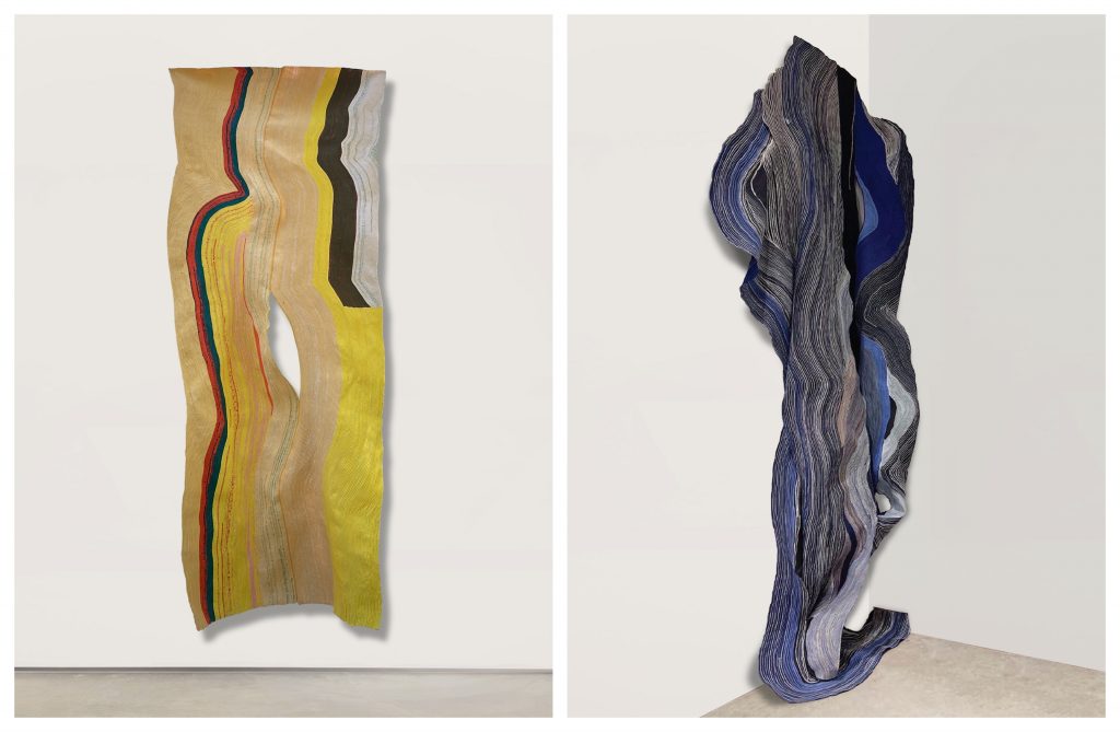 Josefina Concha E.'s intricately woven, undulating pieces, <I>La mirilla<I> (2022) and <I>Sueño de agua que cae, se transforma<I> (2021). Courtesy of Praxis. 