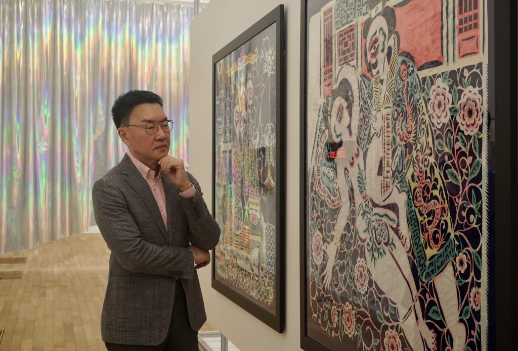 Hong Kong collector Patrick Sun and two 2022 works on paper by Xiyadie commissioned by Sun's Sunpride Foundation, on show at 