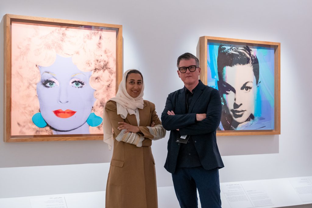 Patrick Moore, Director of the Andy Warhol Museum and Nora Aldabal, Executive Director of Arts AlUla at FAME: Andy Warhol in AlUla. © Arts AlUla / © 2023 The Andy Warhol Foundation for the Visual Arts, Inc.