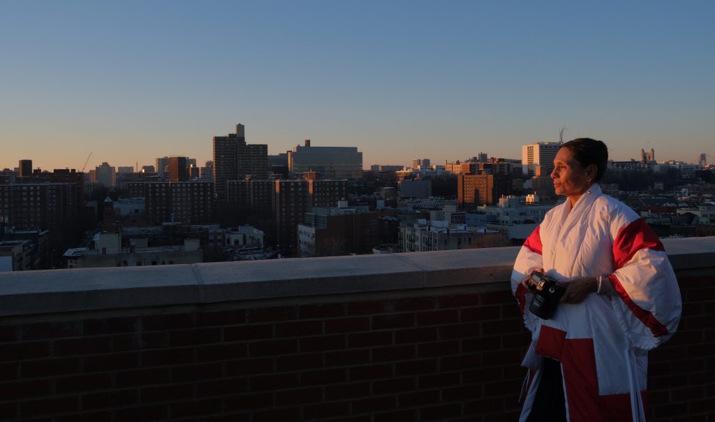 Ming Smith on her Harlem rooftop, 2023. Courtesy of Cadillac.