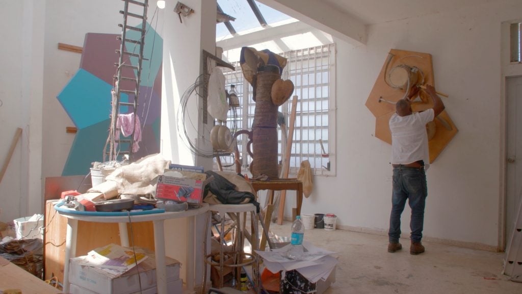 Daniel Lind Ramos at work in his studio. Image Courtesy of Art21 and PBS. 