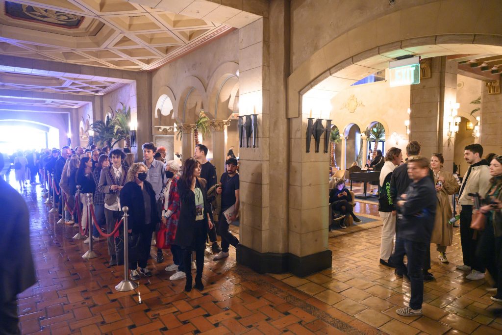 Visitors wait to get into the Felix Art Fair on February 15, 2023 at the Hollywood Roosevelt in Los Angeles.
