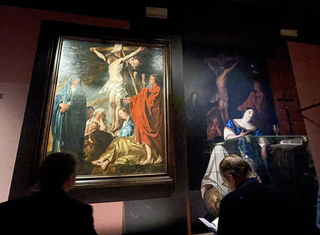 <i>The Crucifixion</i> (c. 1617-1620) by Jacob Jordaens (left), on show at Museum Prinsenhof Delft, is the painting in Vermeer's <i>Allegory of the Catholic Faith</i>. Photo: Vivienne Chow. 
