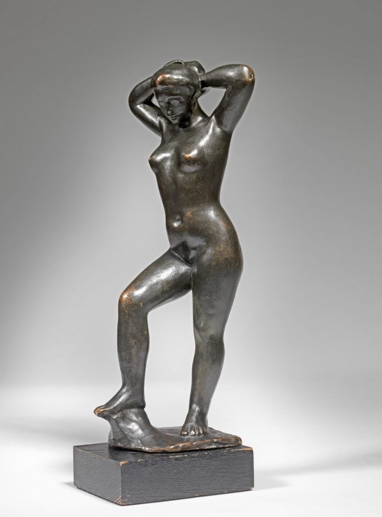 Aristide Maillol, Standing Woman Arranging Her Hair, Rosita (ca. 1898). Courtesy of Sloane Street Auctions.