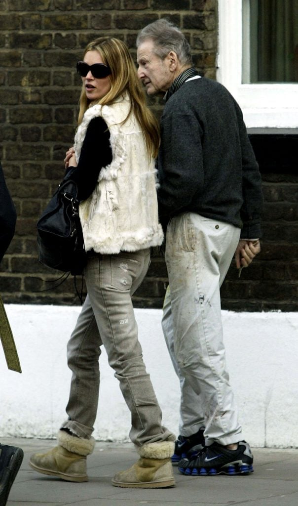 Model Kate Moss is pictured out with painter Lucian Freud on December 16, 2003 in West London