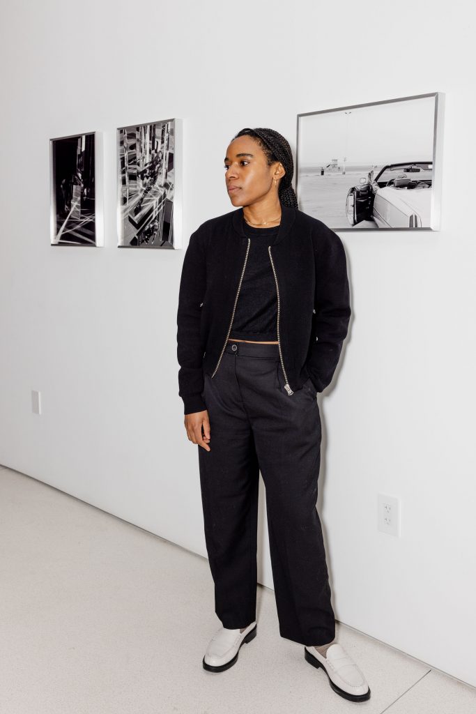 Dannielle Bowman in front of her works. Photo: Lexus Gallegos.
