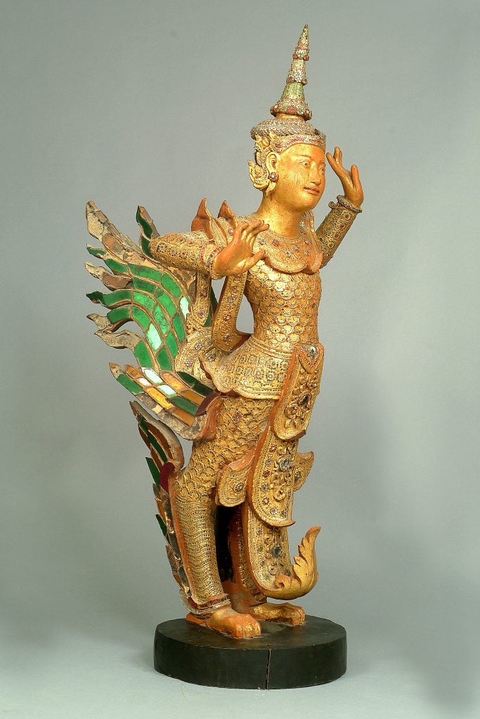 Mythical bird-man and bird-woman dancing (ca. 1857–1885), Myanmar (Burma). Wood with lacquer, gold leaf, and inlaid glass. Burma Art Collection at Northern Illinois University, gift of Konrad and Sarah Bekker.