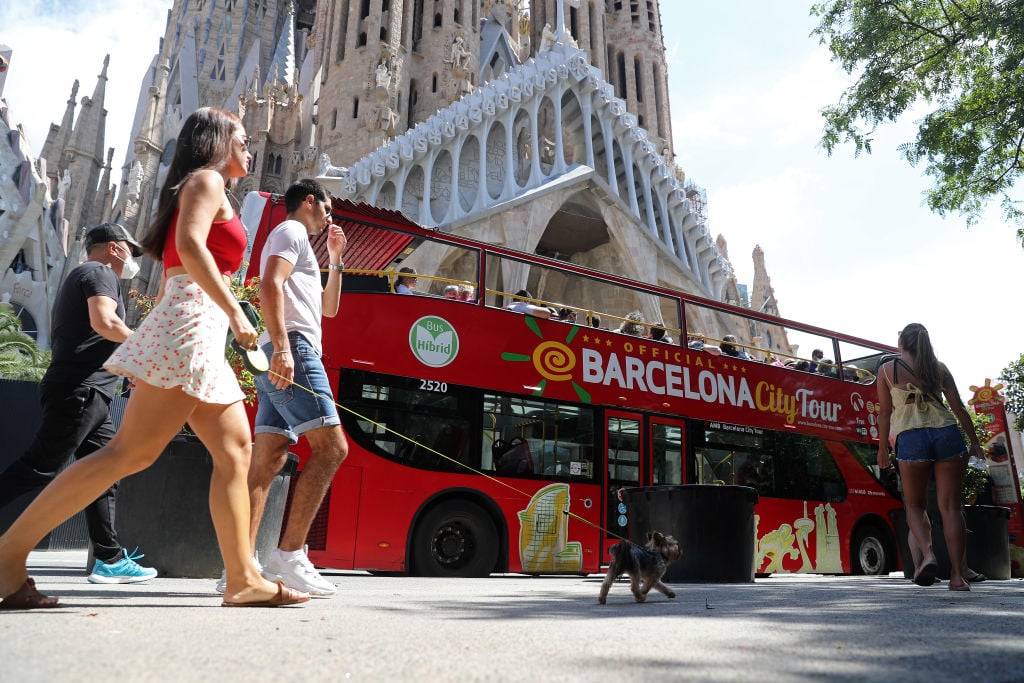 A tour bus outside the Sagrada Familia. Photo by Urbanandsport/NurPhoto via Getty Images.