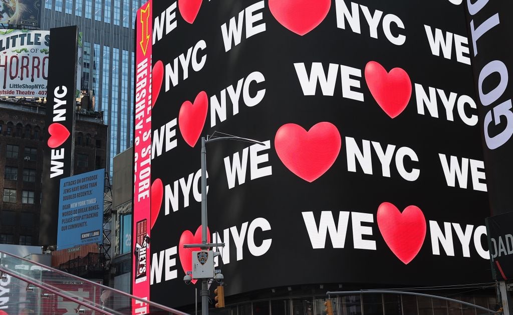 Digital billboards showing the new logo on March 20, 2023 at Times Sqaure to recall a famous logo which was designed by a legendary graphic designer Milton Glaser in 1976 to promote New York during tough times. Photo by Selcuk Acar/Anadolu Agency via Getty Images.