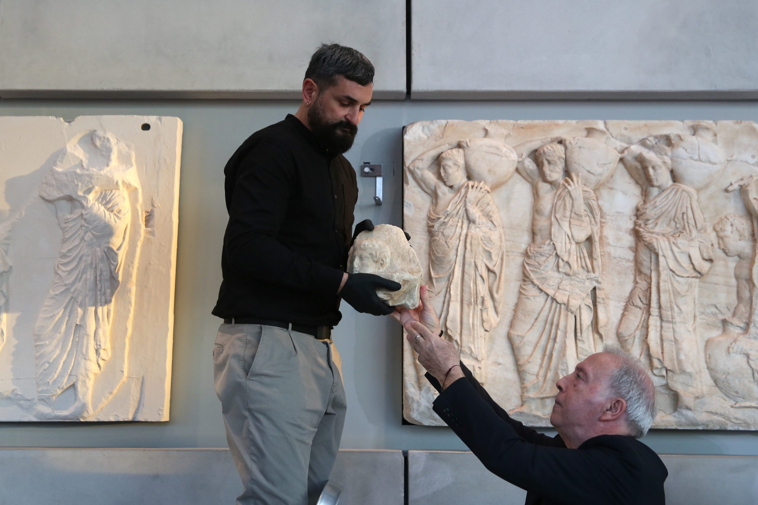 Reunification ceremony for three Parthenon fragments from the Vatican Museum, at the Acropolis Museum in Athens Greece on March 24, 2023. Pope Francis donated the three fragments to the Archbishop Ieronymos. Photo by Costas Baltas/Anadolu Agency via Getty Images.