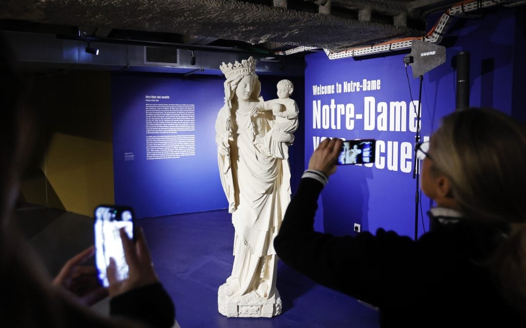The best-know of the thirty seven representations of the Virgin Mary at Notre Dame cathedral on view in "Notre Dame de Paris: at the heart of the construction site," a new underground exhibition in the forecourt of the cathedral. Photo by Thierry Chesnot/Getty Images.
