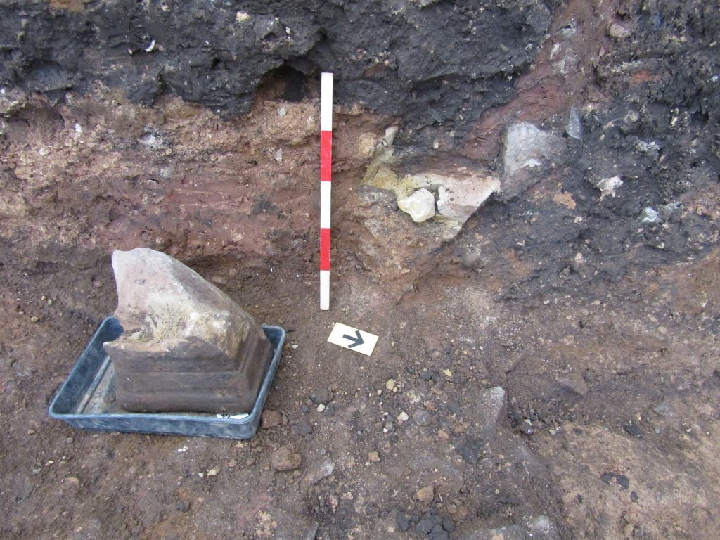 The base of a Roman altar stone was found lying broken and face down in the Roman cellar at Leicester Cathedral. Photo: ULAS.