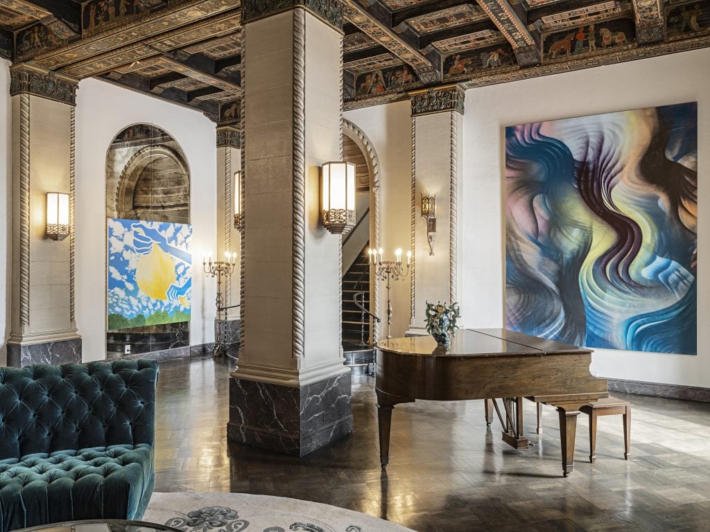 Installation view of "Loyal @ El Royale," Loyal's pop-up exhibition at the El Royale Apartments during Frieze Los Angeles 2023, featuring works by (L to R) Hiejin Yoo, Diana Yesenia Alvarado, and Andrea Marie Breiling. Photo: Jeff McLane, courtesy of Loyal.