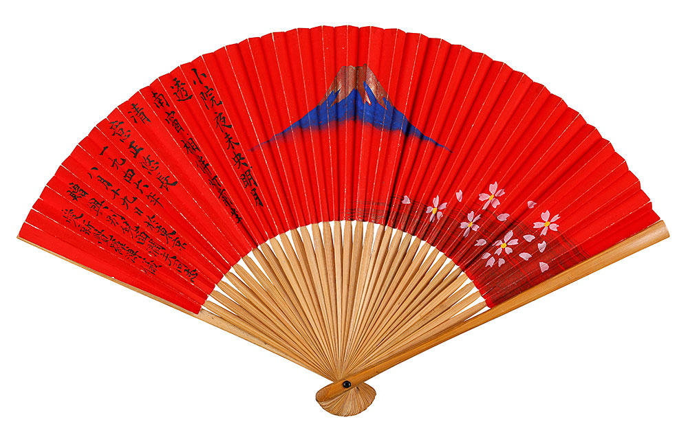 A paper fan featuring a poem personally inscribed by Aisin-Giro Puyi. Courtesy of Phillips.