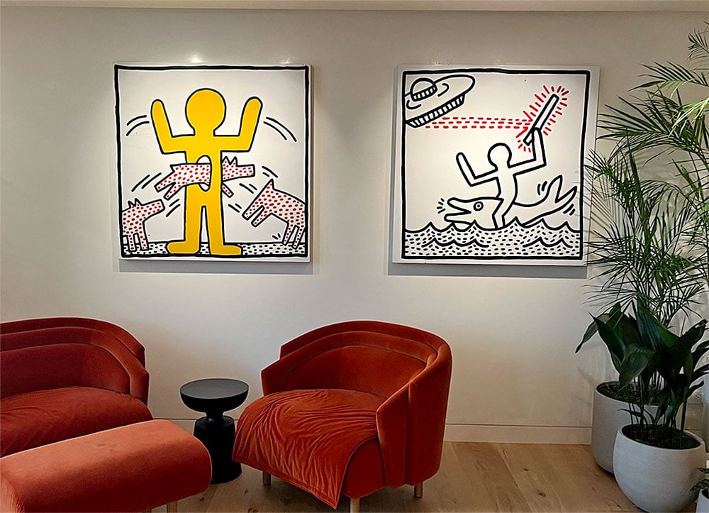 Installation view of Keith Haring enamel paintings in Larry Warsh's living room. Courtesy of Larry Warsh.