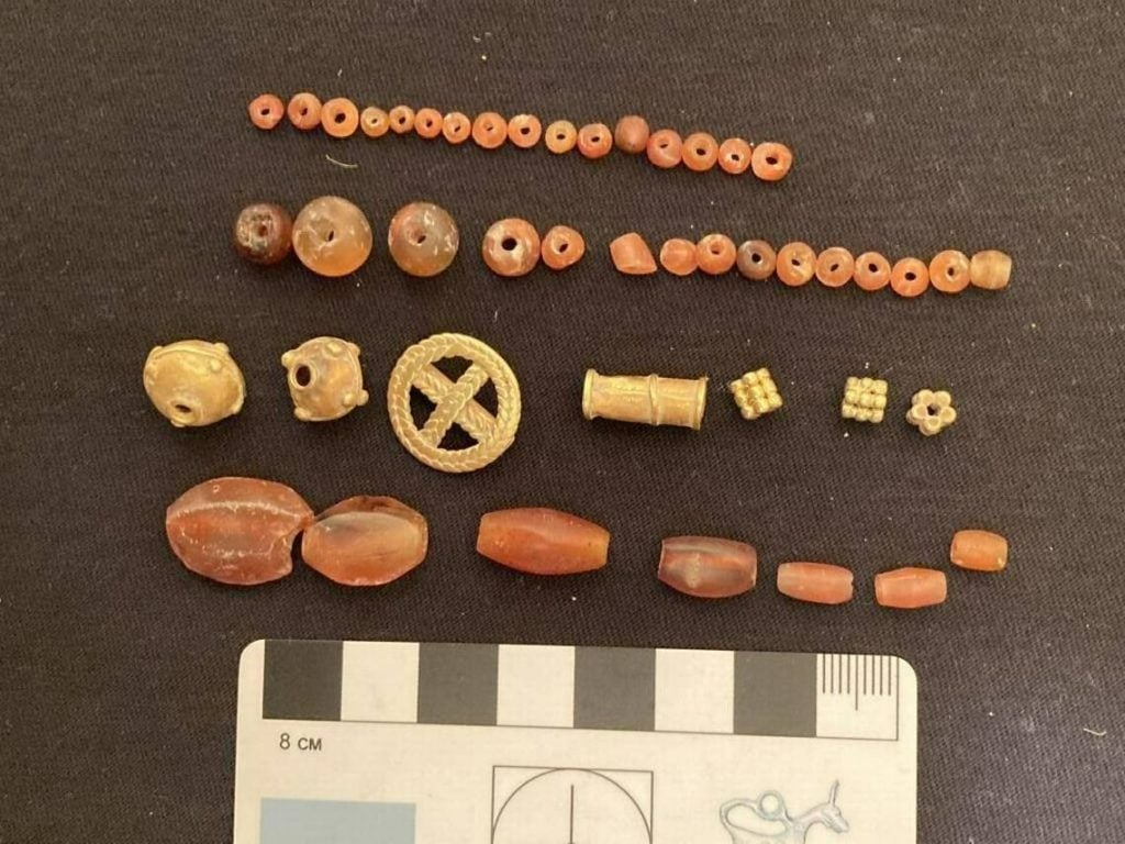 Beads and gold pendants from a recently discovered tomb at the Metsamor necropolis in Armenia. Photo courtesy of Science in Poland.