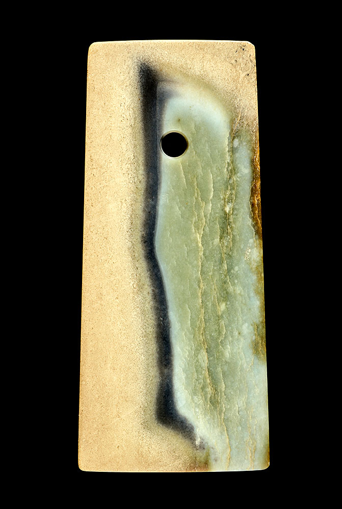 Archaic jade ceremonial axe (Yue) (Zhou dynasty). Courtesy of Sotheby's.