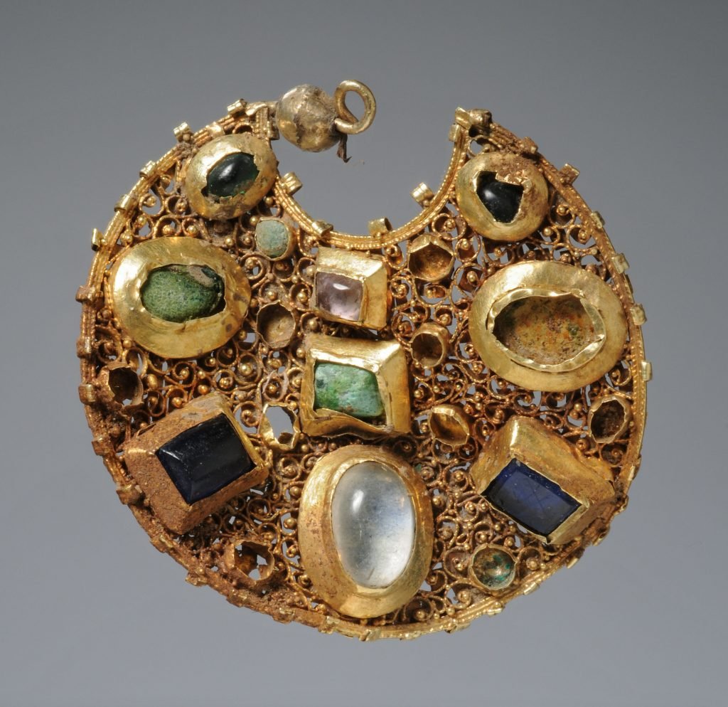 One of the gold earrings with semi-precious gems in the Byzantine style. Photo: ALSH.