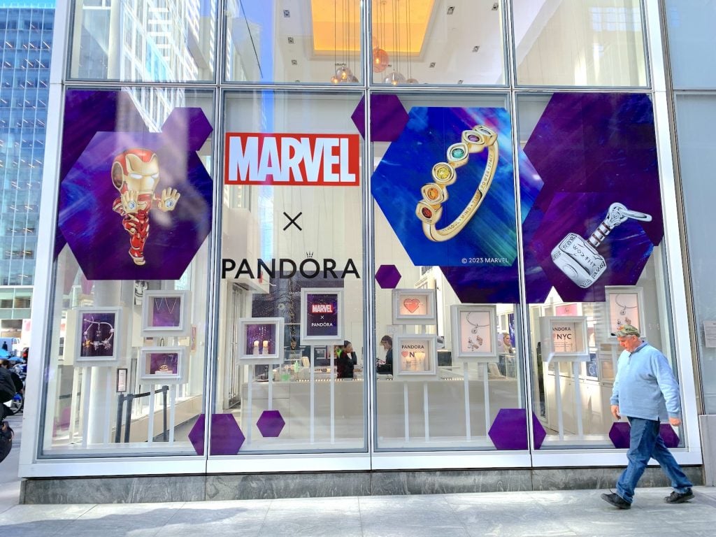 A storefront near Times Square advertises the Marvel x Pandora line of diamond jewelry.