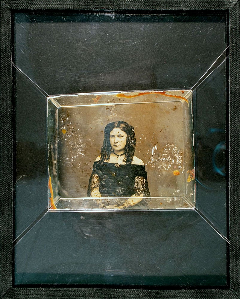 Daguerrotype of an unknown woman, dubbed the Mona Lisa of the Deep, recovered from the Ship of Gold shipwreck. Courtesy of Holabird Western Americana Collections.