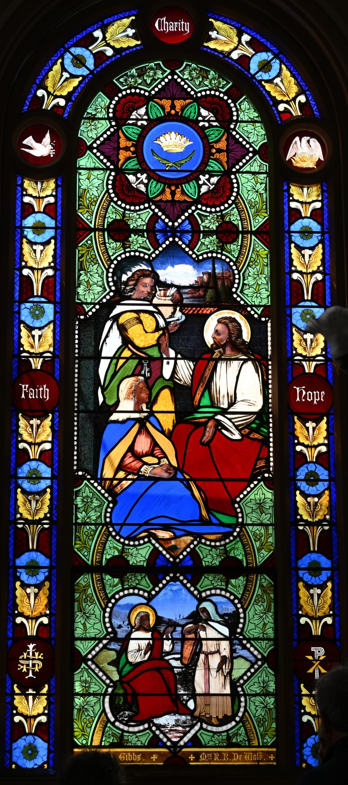 Henry Sharp Studio, Jesus with dark skin speaking to the sisters Martha and Mary in a window for St. Mark's Church in Warren, Rhode Island (1877). Photo by Michel Raguin.