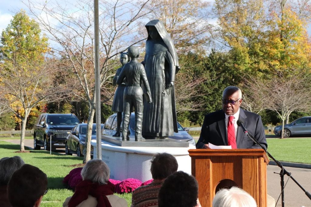 United States Supreme Court Justice Clarence Thomas flew on Republican donor Harlan Crown's private plane to the dedication of a statue to Thomas's eighth grade teacher, Sister Mary Virgilius Reidy, at a cemetery in Mahwah, New Jersey. Crow also paid for the sculpture. Photo courtesy of the Catholic Cemeteries of the Archdiocese of Newark.