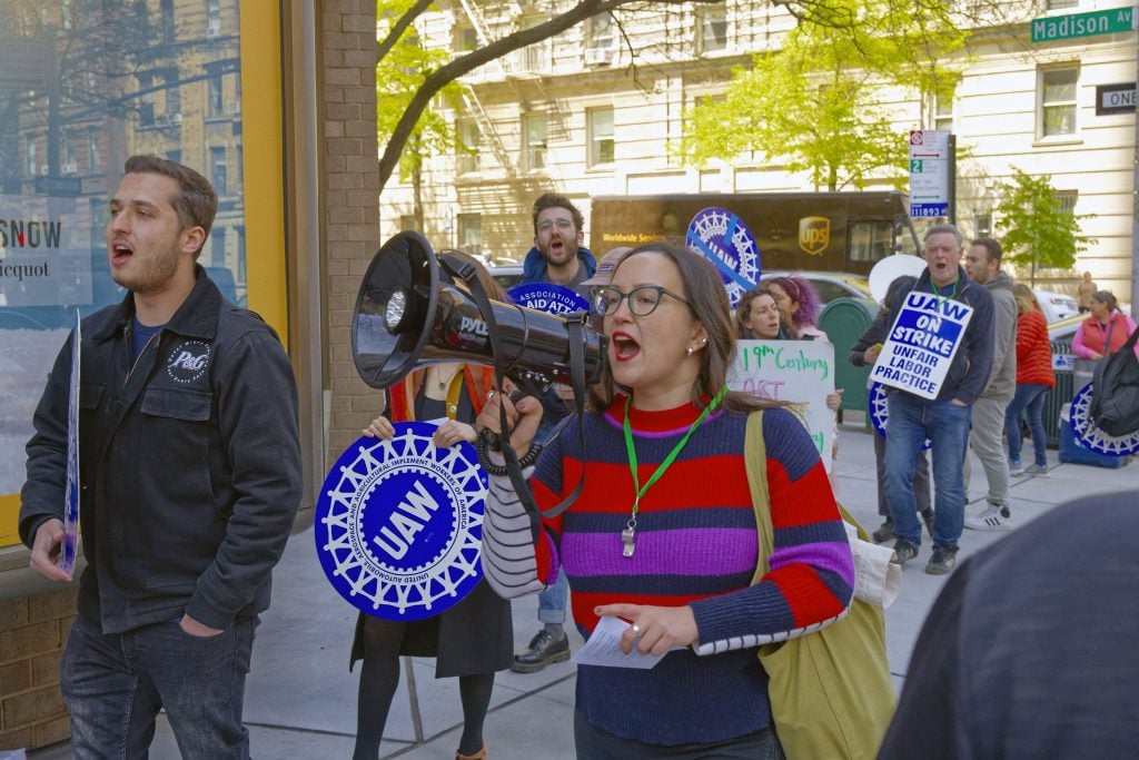 Union members from New York's Hispanic Society Museum and Library picket outside the Upper East Side home of museum chairman Philippe de Montebello. Photo by Patrick Lenaghan.