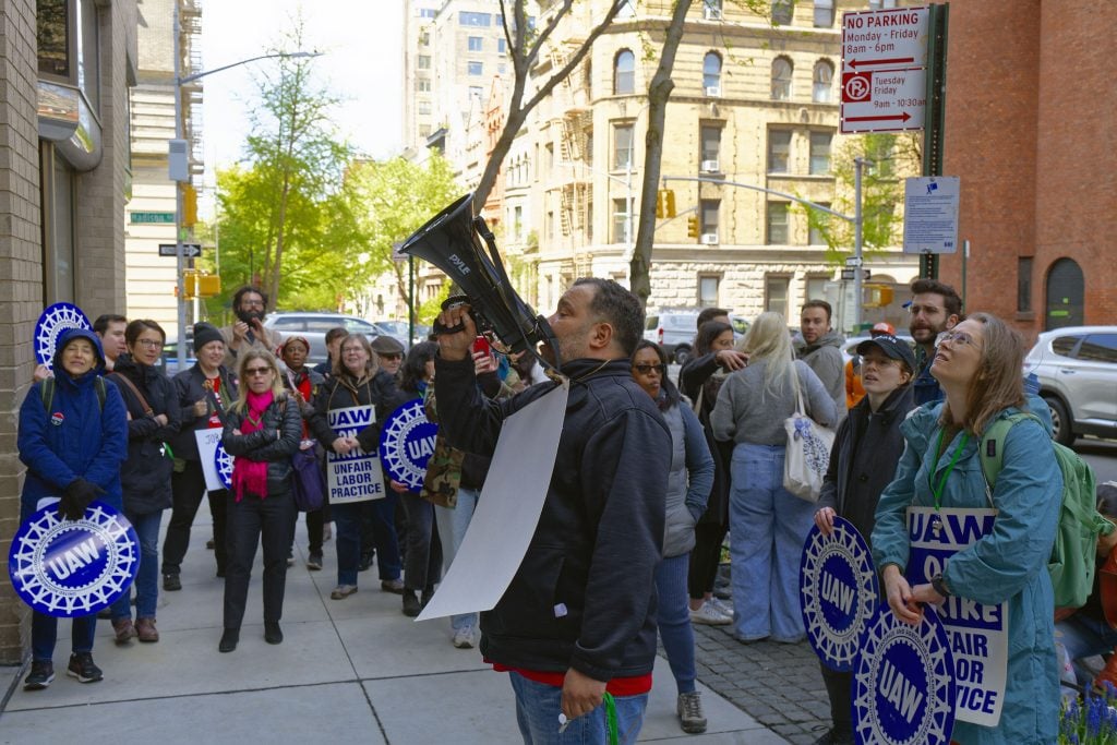 Union members from New York's Hispanic Society Museum and Library picket outside the Upper East Side home of museum chairman Philippe de Montebello. Photo by Patrick Lenaghan.