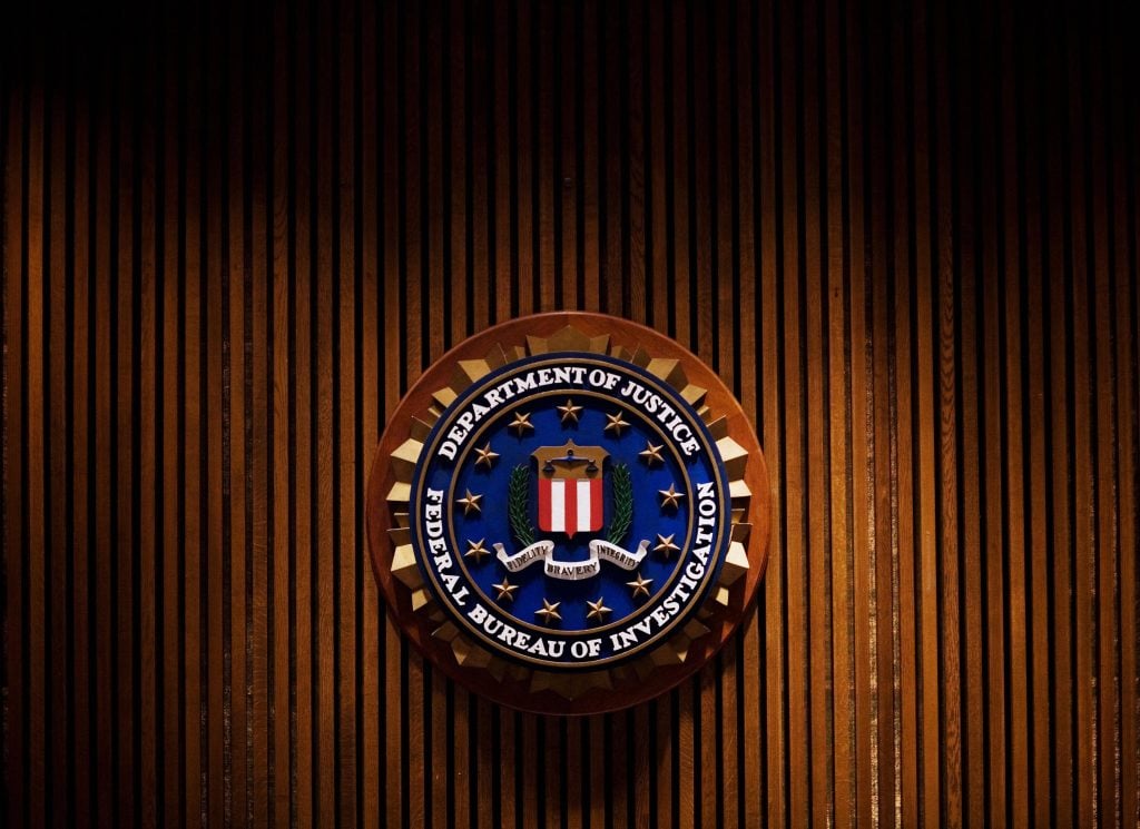 A crest of the Federal Bureau of Investigation inside the J. Edgar Hoover FBI Building in Washington, DC. Photo: Mandel Ngan / AFP via Getty Images.