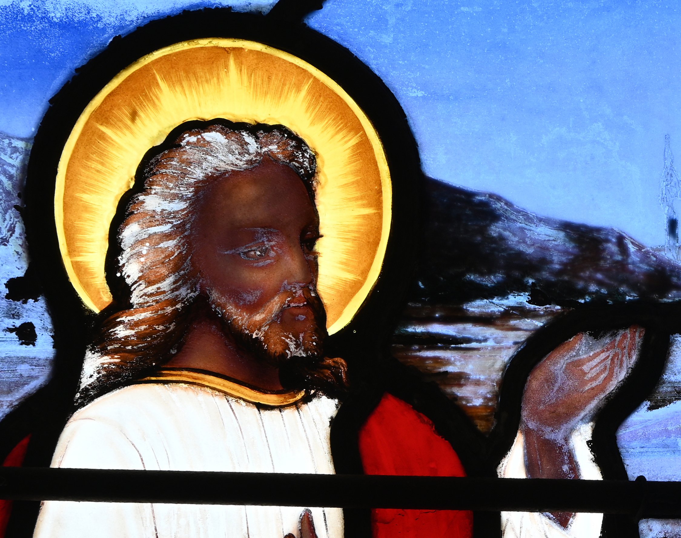 Henry Sharp Studio, Jesus with dark skin in a window for St. Mark's Church in Warren, Rhode Island (1877). You can see the paint loss of the black paint in the outlines. Photo by Michel Raguin.