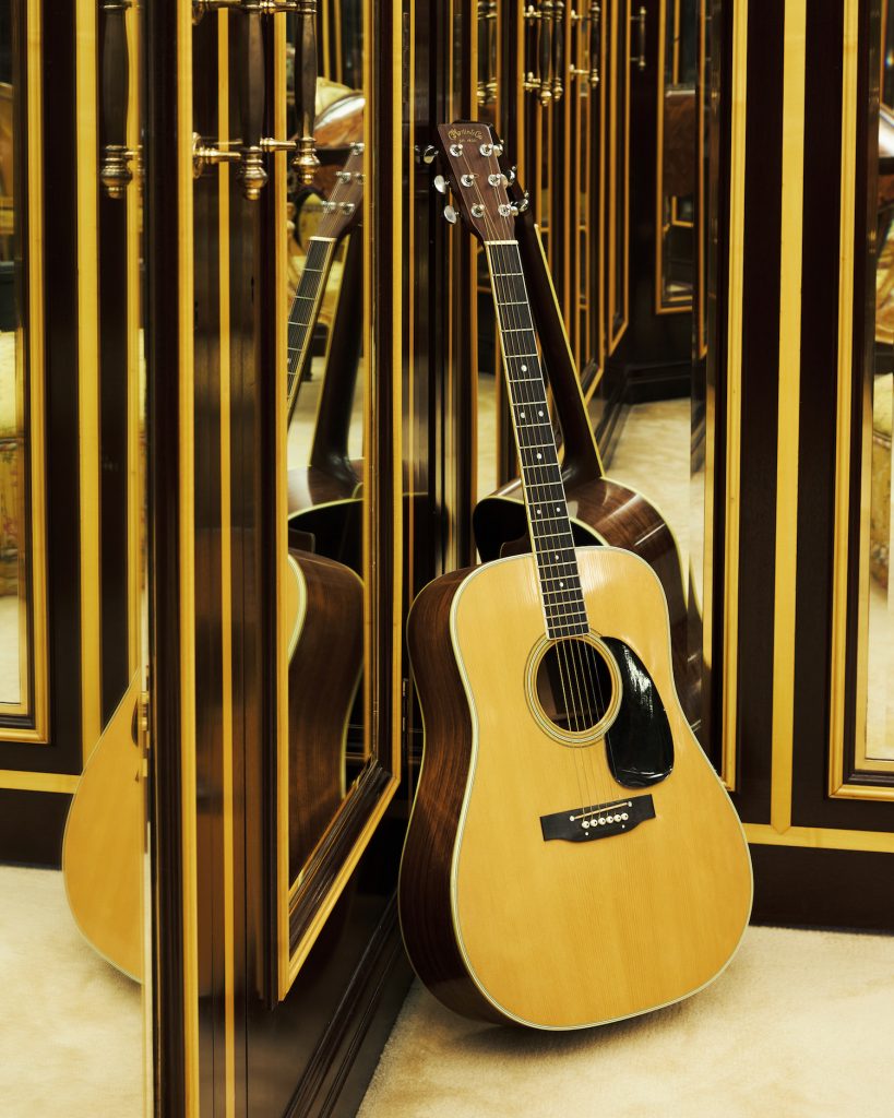 Freddie Mercury’s 1975 Martin D-35 Acoustic Guitar, in its original case, photographed in his dressing room at Garden Lodge. Image courtesy Sotheby's.