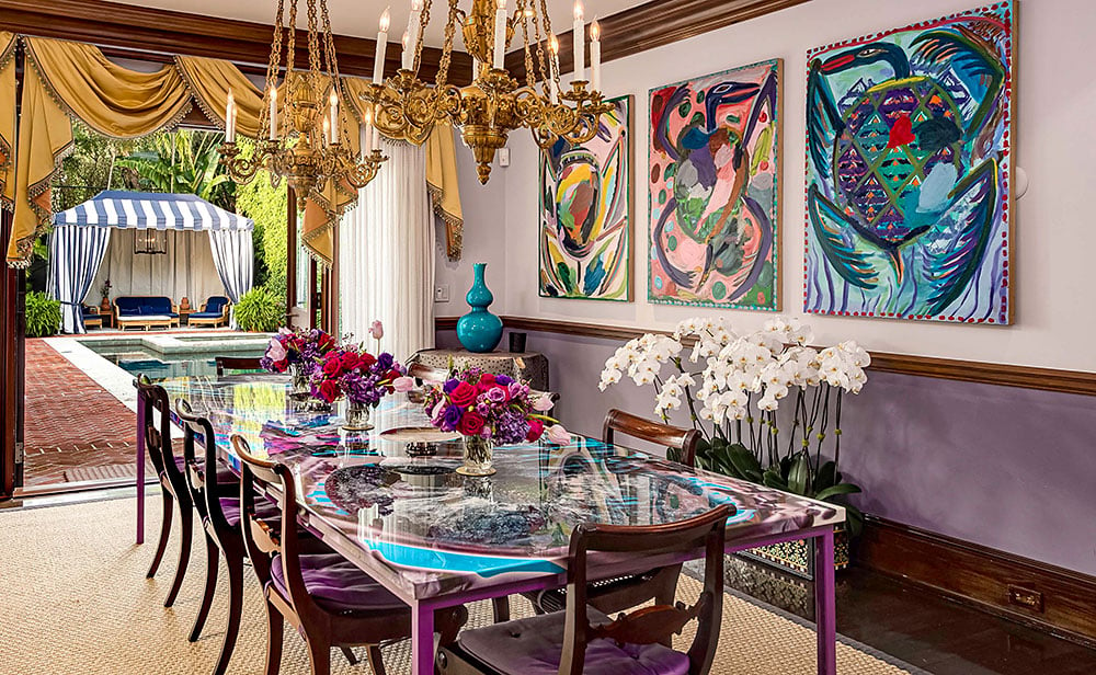 The dining room of Peter Brant's Buttonwood property in Palm Beach, Florida, with what appears to be Josh Smith artwork on the walls. Courtesy of Brown Harris Stevens.