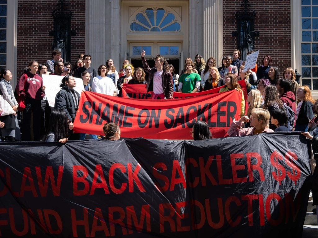 Harvard University students and PAIN members protesting in front of the school’s Arthur M. Sackler Museum. Photo: Dumebi Malaika Menakaya. Courtesy of PAIN.