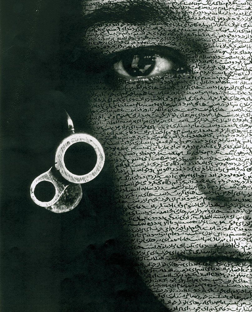 Shirin Neshat, <em>Speechless</em> (1996). Pen and ink over gelatin silver print. Courtesy of Jen Faurschou.