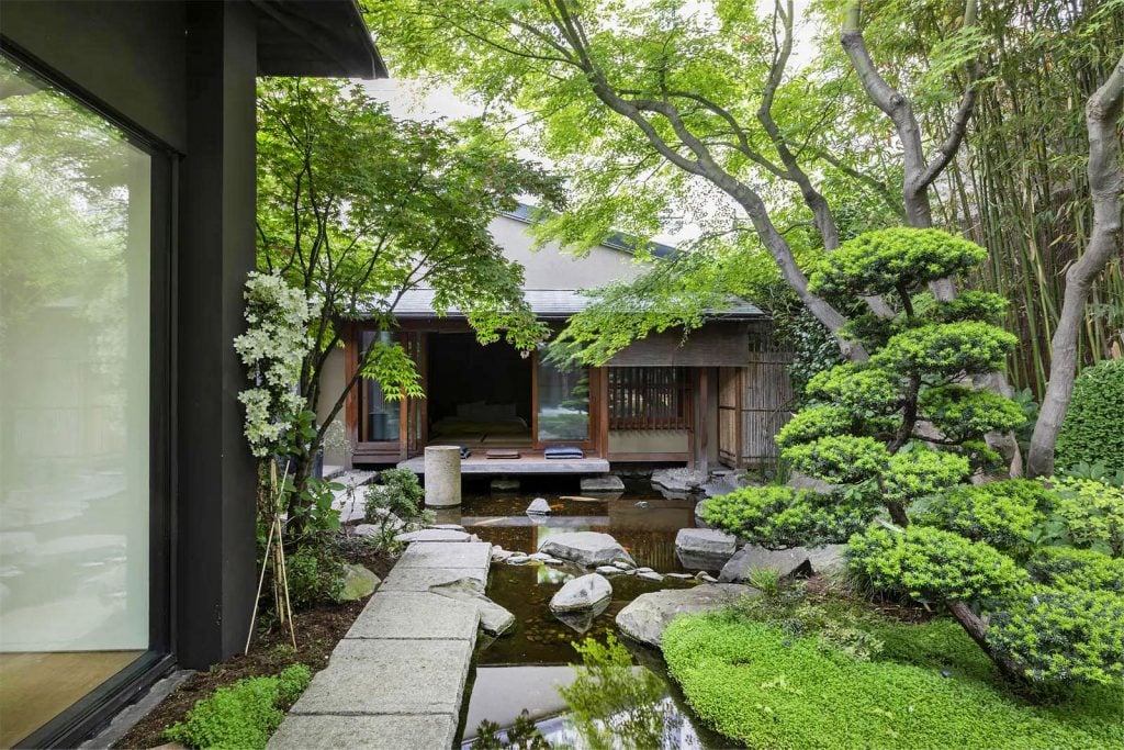 The sprawling Japanese garden at the center of Kenzo House in Paris. Photo: Jimmy Cohrssen. Courtesy of Belles Demeures de France/Christie's.