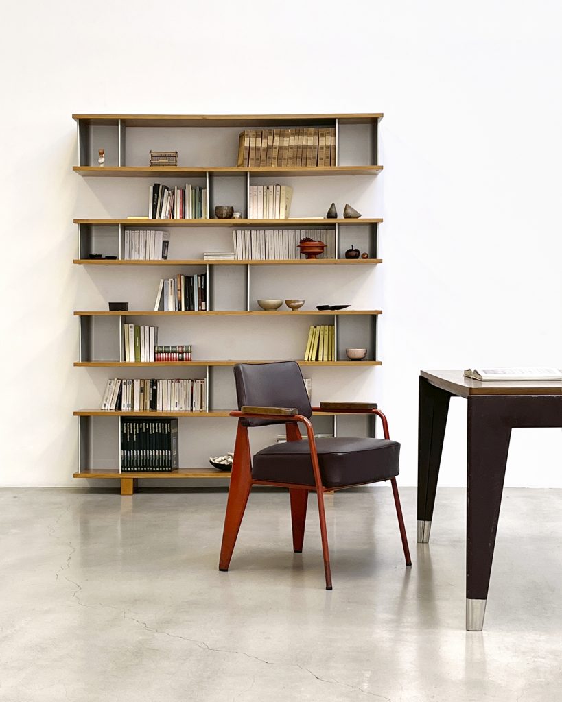 Charlotte Perriand, Wall-mounted bookshelves (1959); Jean Prouvé, Direction No. 352 Office Chair (1951) and Secretary Desk (1950). Courtesy of Galerie Patrick Seguin.