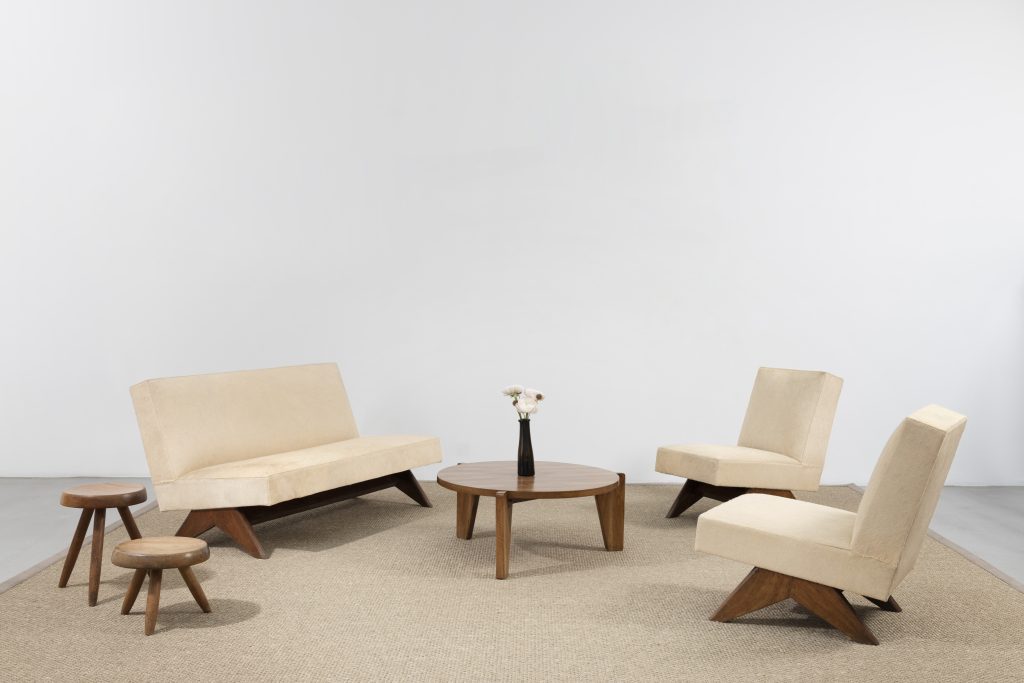 Pierre Jeanneret, Sofa set (ca. 1955–56); Jean Prouvé, Guéridon No. 402 (ca. 1950); Charlotte Perriand, Stools (ca. 1955). Courtesy of Galerie Patrick Seguin.
