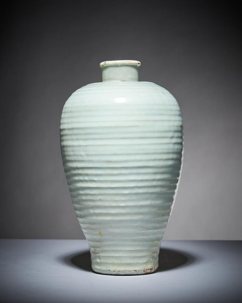 A Song Dynasty celadon ribbed vase from the collection of Edward Copleston Radcliffe sold for £34,000 ($42,300) at Dreweatts. Photo courtesy of Dreweatts. 