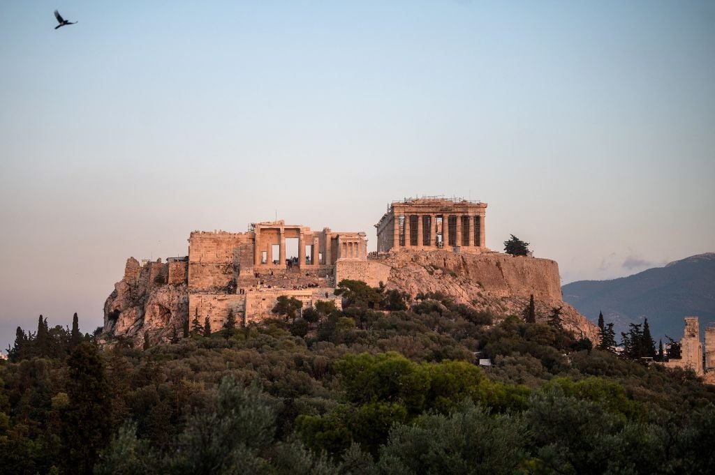 The Parthenon Temple at the top of the Acropolis hill in Athens. Photo by Angelos Tzortsinis/AFP via Getty Images.