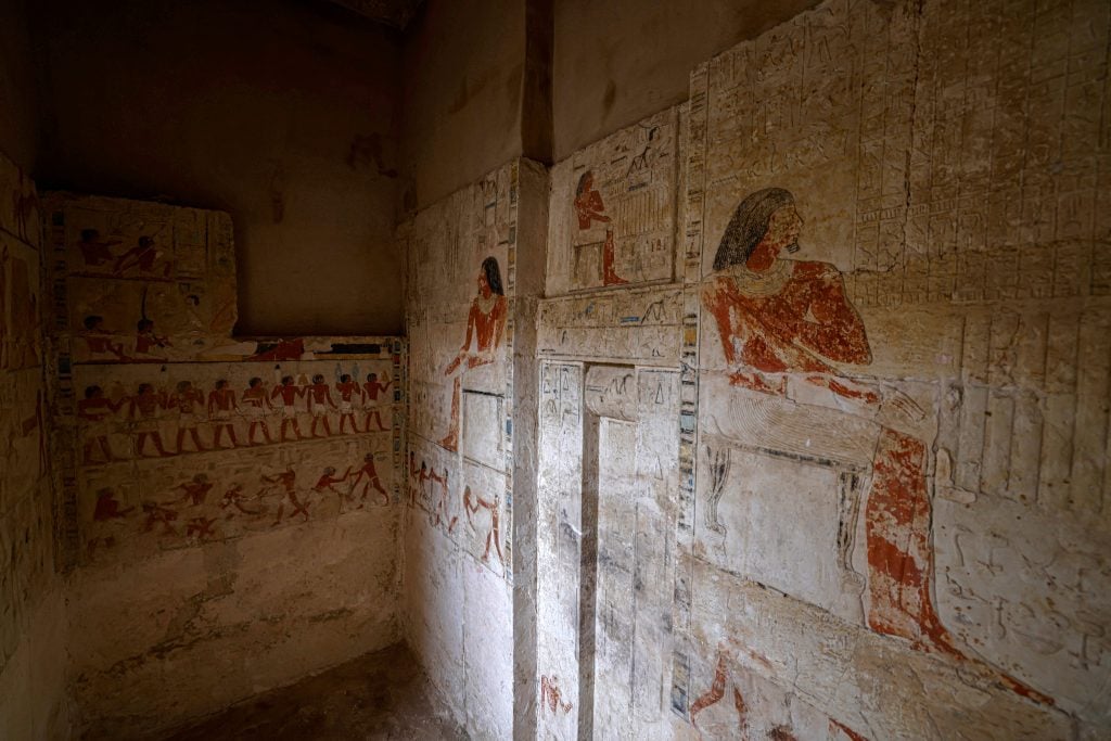 The walls of one newly discovered ancient tomb. Photo: Khaled Desouki / AFP via Getty Images.