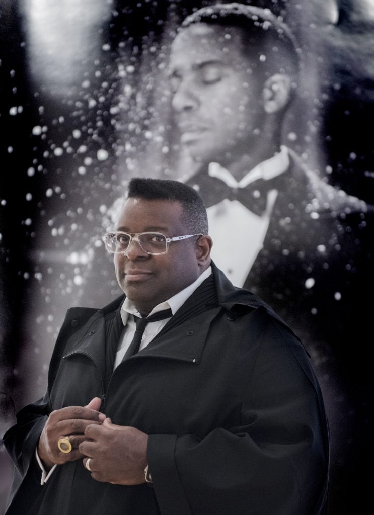 Sir Isaac Julien portrait at his exhibition 