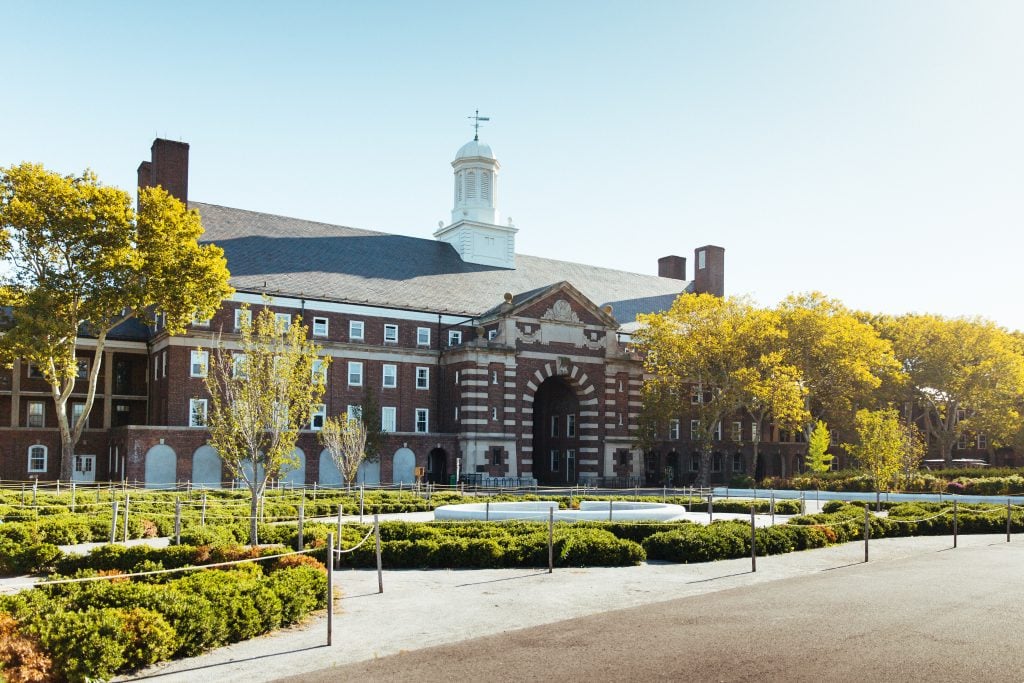 Liggett Hall, designed by architects McKim Mead and White, on Governors Island, hosted part of the Governors Island Art Fair in 2017, but is now in need of renovations before it can be activated for public use. Photo courtesy of the Trust for Governors Island.