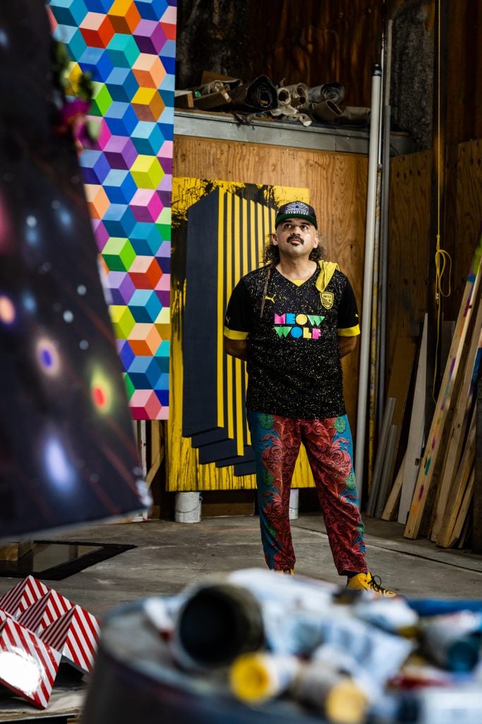Meow Wolf collaborative artist Ricardo Paniagua in the studio. Photo by Jordan Mathis, courtesy of Meow Wolf.