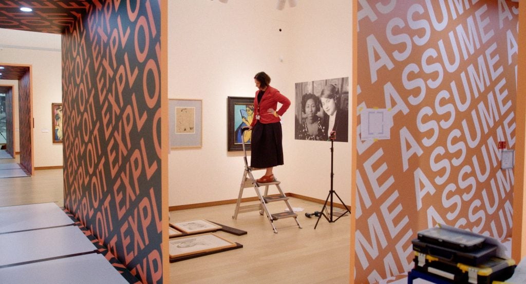 Curator Beatrice von Bormann installing 