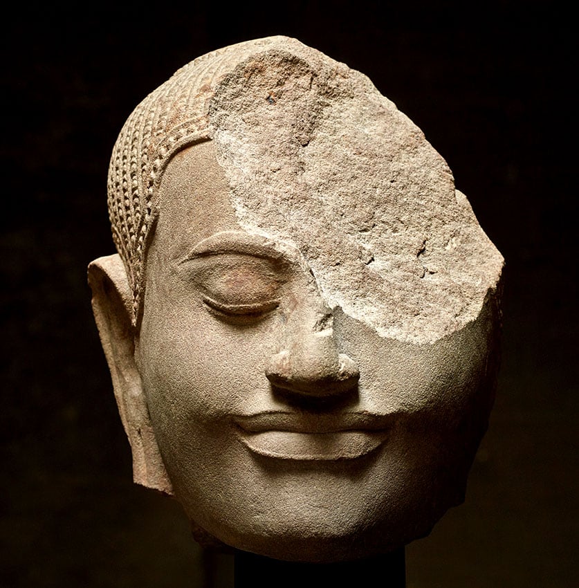 Head of a deity, Bayon-style, late 12th century–early 13th century, Cambodia. Presented by Axel Vervoordt.