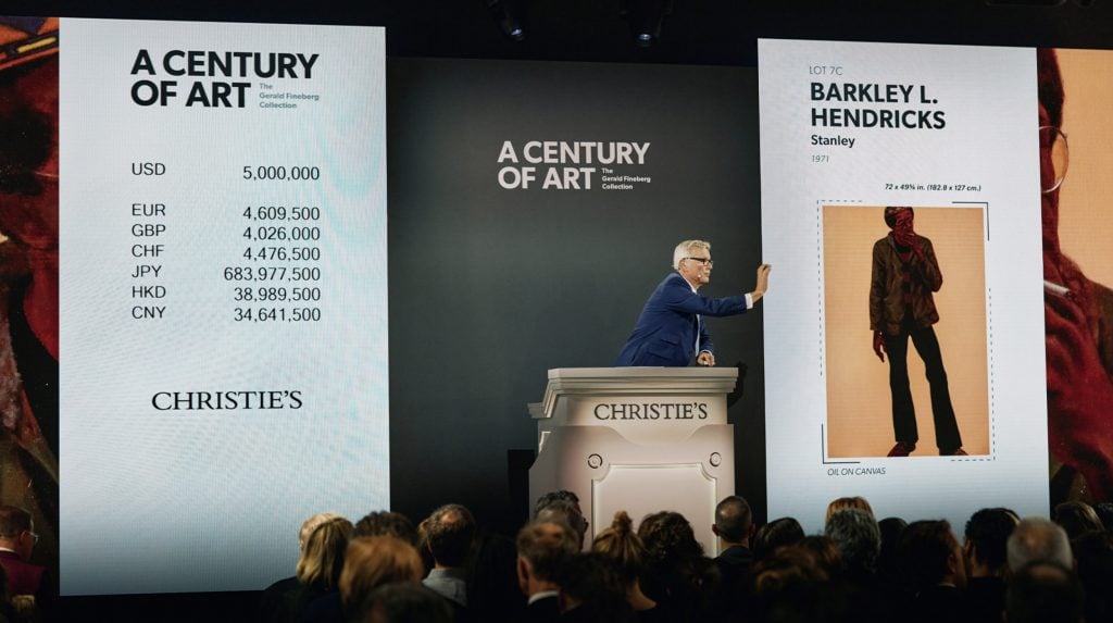 Christie’s Global President, Jussi Pylkkänen, sells Barkley L. Hendricks’s Stanley for a record-breaking $6.1 million. Photo courtesy Christie's.