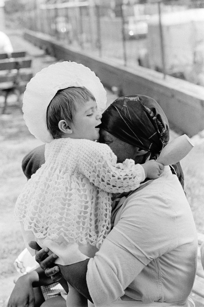 Ernest Cole, from <em>House of Bondage</em>. Servants are not forbidden to love. The woman holding this child said: "I love this child, though she’ll grow up to treat me just like her mother does. Now she is innocent." Photo ©Ernest Cole, courtesy of Magnum Photos.