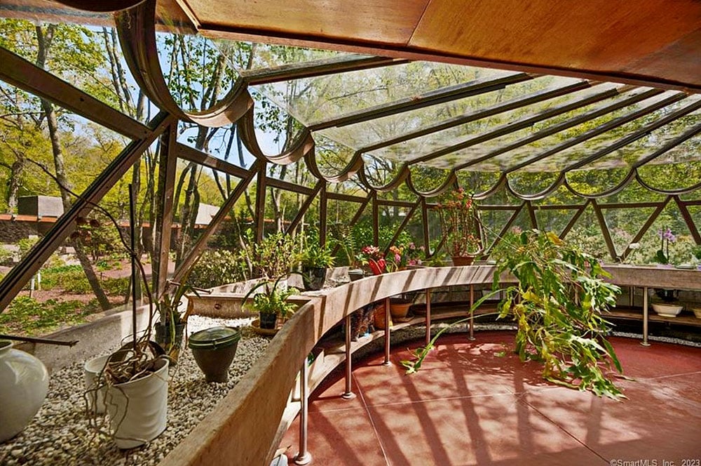 The circular windows used in Tirranna's greenhouse were left over from the Guggenheim project. Courtesy of Coldwell Banker Realty.